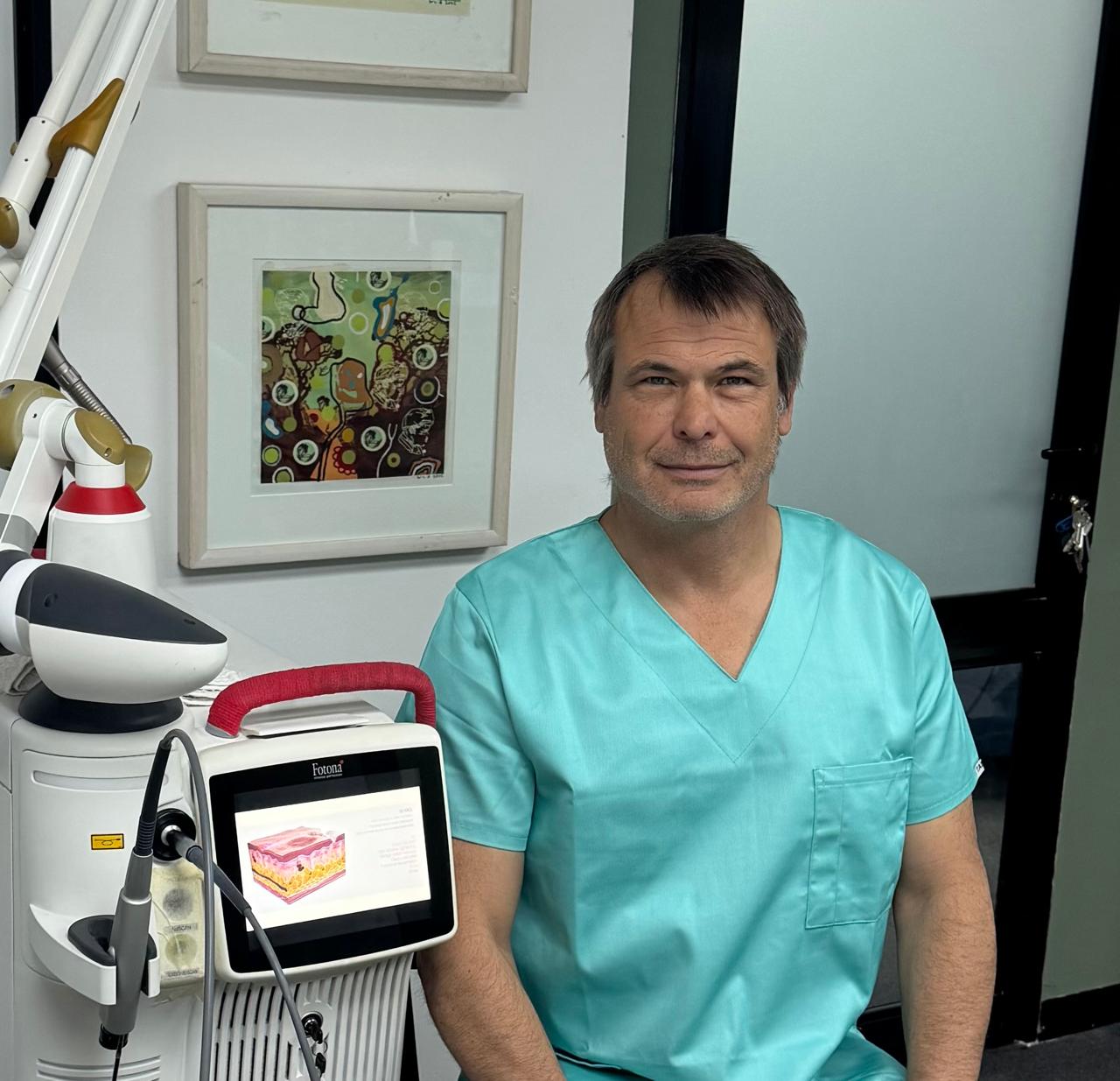 Dr Scott Barker with Fotona laser, Green Point Cape Town